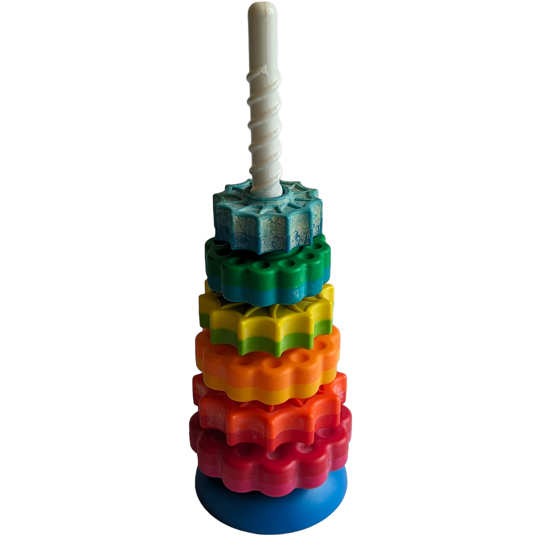 Fat Brain Toys, Spinagain Toy, Cognitive & Motor Skills Development, It's a stacking toy with a spin—literally!

Drop the vibrant discs onto the threaded corkscrew pole and go ooooh as they spin fast and smooth to settle onto the reversible base.

Choosing how to set the base is half the fun for your toddler. Pick either the wobble base or turn it over for a solid seat.
