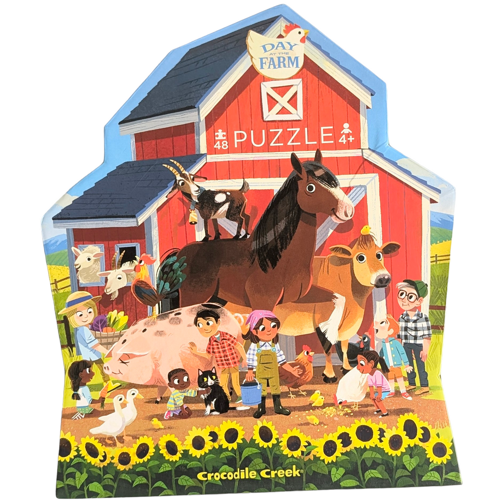 Crocodile Creek, Day At The Farm - 48 Pieces, Cognitive & Motor Skills, Crocodile Creek Day at the Farm 48-piece puzzle will transport you to a fun, whimsical barnyard! This observation puzzle features lots of fun and humorous things that are happening around the farm. Richly detailed puzzle is 18" X 24" When complete. The uniquely shaped packaging makes storing this puzzle even more fun. All Crocodile Creek puzzles are printed with soy-based ink on recycled cardboard.