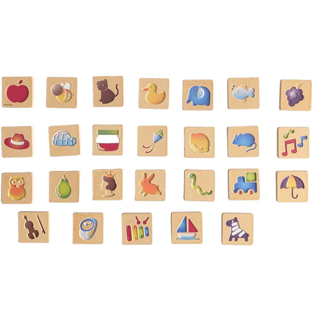 PlanToys, Alphabet A-Z 5637, Sensory & Language Development, Develop your fundamental skills with this alphabet set. The two-sided wooden tiles feature 26 intended capital letters and pictures of objects that correspond to the letter. Trace the letters with your finger and expand your vocabulary! Made in PlanWood.