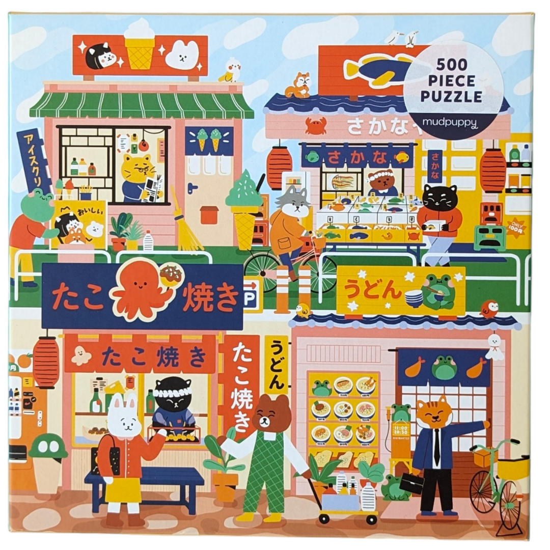 Mudpuppy, Open for Business - 500 Piece Puzzle, Cognitive & Motor Skills Development, Open for Business 500 Piece Family Puzzle from Mudpuppy features bright illustrations of local stores and restaurants in Japan warmly welcoming the locals.

Mudpuppy puzzles are packaged in matte-finish sturdy boxes, perfect for gifting, reuse, and storage.



500pc puzzle: 20 x 20"", 51 x 51 cm
Box: 8 x 8 x 2"", 20 x 20 x 5 cm
Ages 8-99
Puzzle greyboard contains 90% recycled paper. 