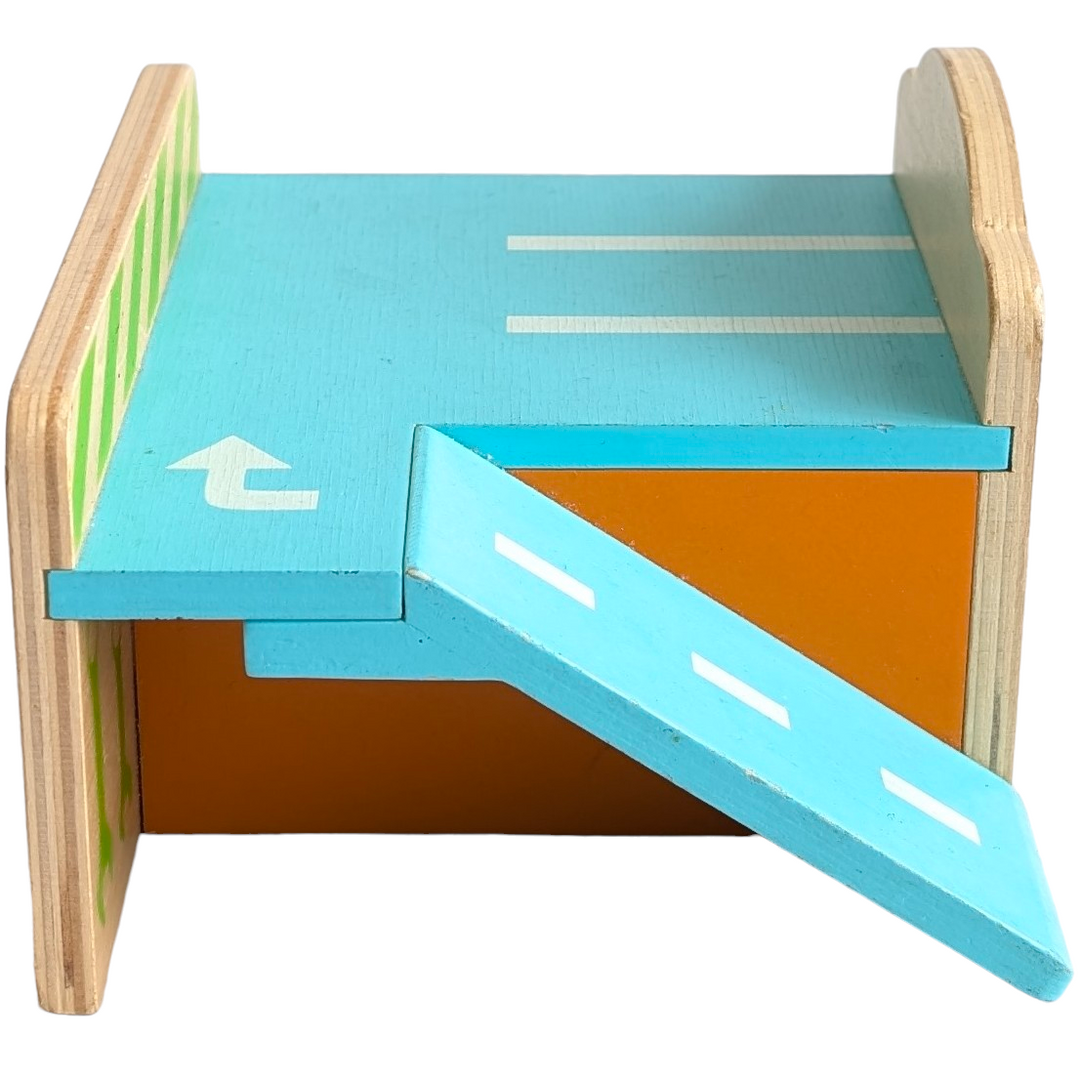 Djeco , Mini Garage , Cognitive & Motor Skills Development, This Djeco mini wooden garage is perfect for little hands to play with.

Made from smooth, polished wood it comes with 3 chunky wooden vehicles.  The wooden garage has 2 floors and the top floor has a ramp leading down to the ground.  Measuring 17 x 11.5 x 15 cm this is an ideal size for young toddlers and the wooden vehicles are easy to hold. 