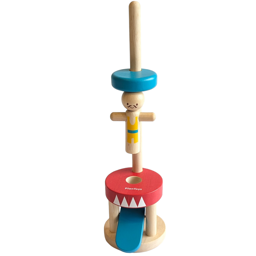 PlanToys, Jumping Acrobat, Cognitive & Motor Skills Development, Let’s have some fun with the Jumping Acrobat! Push the Blue bar down to make the acrobat jump up to the top. This helps enhance observational and experimental skills.