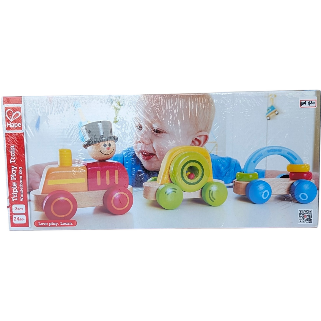 Hape, Triple Play Train, Creative & Imaginative Play, This wooden pull-train has three cars full of activities to keep engineers pulling, pushing, walking, and exploring. Slide rings, shake beads, stack engine block. Pull, push and explore. Find what makes each car special.