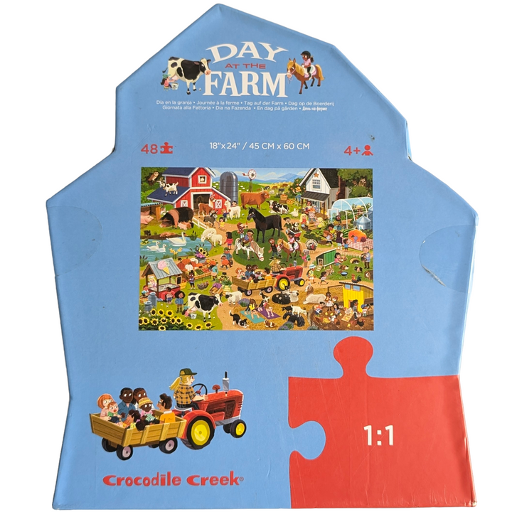 Crocodile Creek, Day At The Farm - 48 Pieces, Cognitive & Motor Skills, Crocodile Creek Day at the Farm 48-piece puzzle will transport you to a fun, whimsical barnyard! This observation puzzle features lots of fun and humorous things that are happening around the farm. Richly detailed puzzle is 18" X 24" When complete. The uniquely shaped packaging makes storing this puzzle even more fun. All Crocodile Creek puzzles are printed with soy-based ink on recycled cardboard.